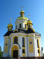 beautiful church on the background of blue sky