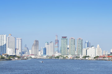 Fototapeta premium Business district cityscape with blue sky, Bangkok