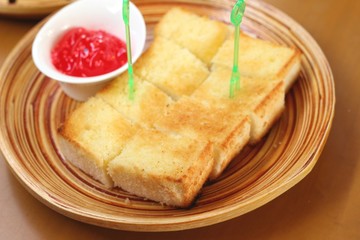 Bread, butter and strawberry jam