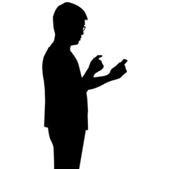 Silhouette man looking at smartphone on hand