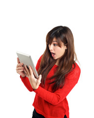 Fototapeta premium Surprised Asian girl holding tablet