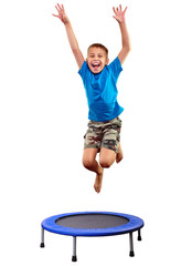 child exercising and jumping on a trampoline