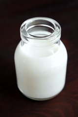 Obraz na płótnie Canvas Small bottle of milk