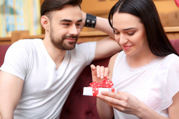 Beautiful young couple in the cafe