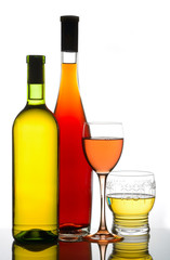 Rosé and white wine with bubbles in glass