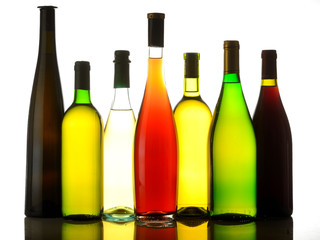 Wine bottles of various shapes and colours