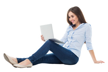 Young woman sitting with laptop