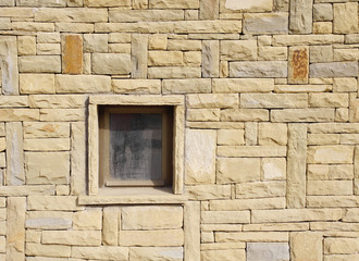 Stone wall with window closeup