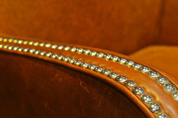 Obraz premium Handle studded brown leather chair