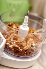Kernel walnuts in a food processor