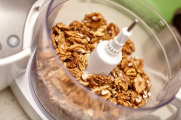 Kernel walnuts in a food processor