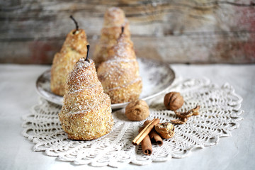 Crusty dough wrapped pears with sesame and walnuts