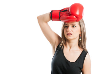 Female boxer feeling tired and exhausted