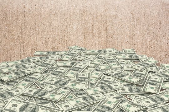 Composite image of pile of dollars