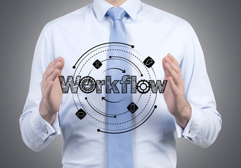 businessman holding workflow