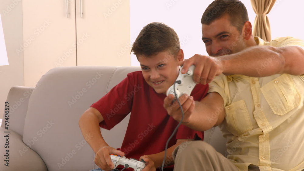 Sticker Father and son playing video games together