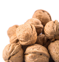Walnut nuts over white background