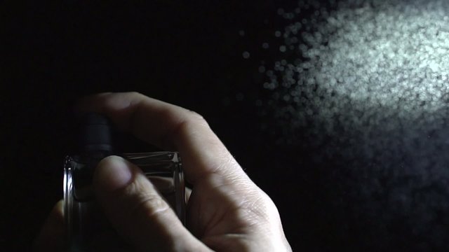 Perfume spray in the air