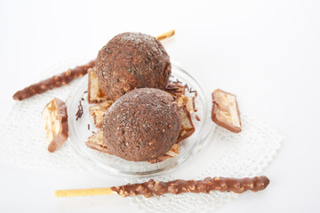 Cupcake with chocolate on wooden background
