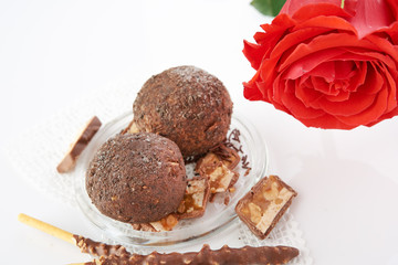 Cupcake with chocolate on wooden background
