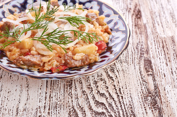 Oriental shah pilaf, pilaw, plov, rice with meat in pastry filo