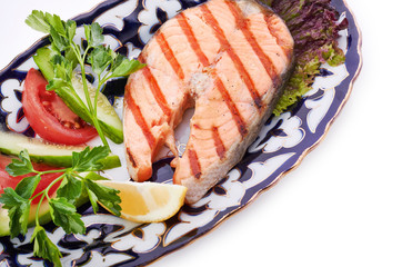 grilled salmon with asparagus, pea, yellow peppers, carrots and