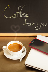 Cup of coffee in coffee shop.