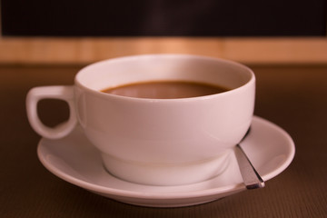Cup of coffee in coffee shop.