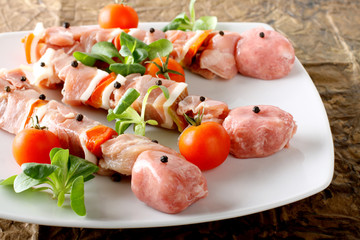 Skewers of meat mixed