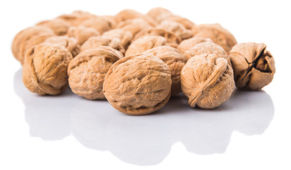 Walnut nuts over white background