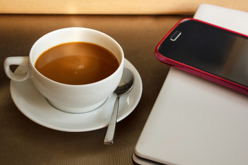 Cup of coffee in coffee shop.