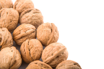 Walnut nuts over white background