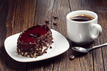 Delicious cake with chocolate and cherry jelly