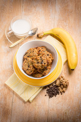 breakfast with chocolate cookie  muesli and banana