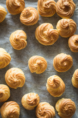 Freshly Baked Puffs on Baking Paper