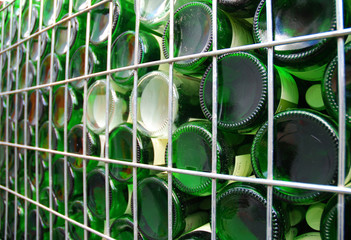 Old used wine bottles at a storage