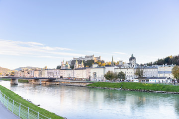 Naklejka premium City view of Salzburg with its river, Austria