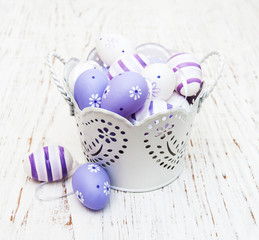 Fototapeta na wymiar Easter eggs in a metal pot