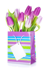 Purple tulip bouquet in gift bag