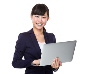 Asian business woman using laptop