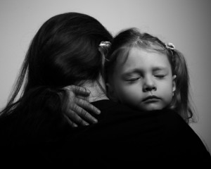 Depression daughter hugging her mother with sad face