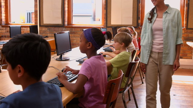 Pupils in computer class at school