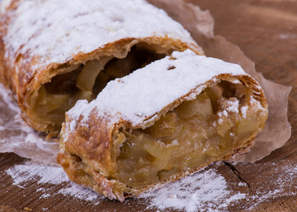 Apple strudel with powdered sugar vanilla
