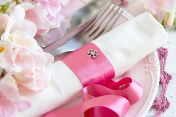 Festive wedding table setting in pink