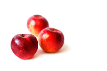 Red apples on white background