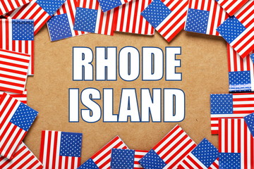The title Rhode Island with a border of USA flags