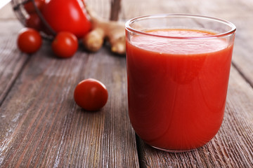 Glass of tomato juice with cherry tomatoes