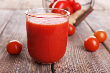 Glass of tomato juice with cherry tomatoes