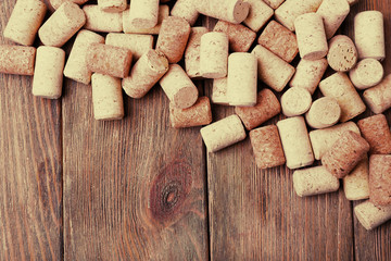 Wine corks on wooden background