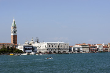 Schiavoni quay, doges palace and water traffic in summer Venice
